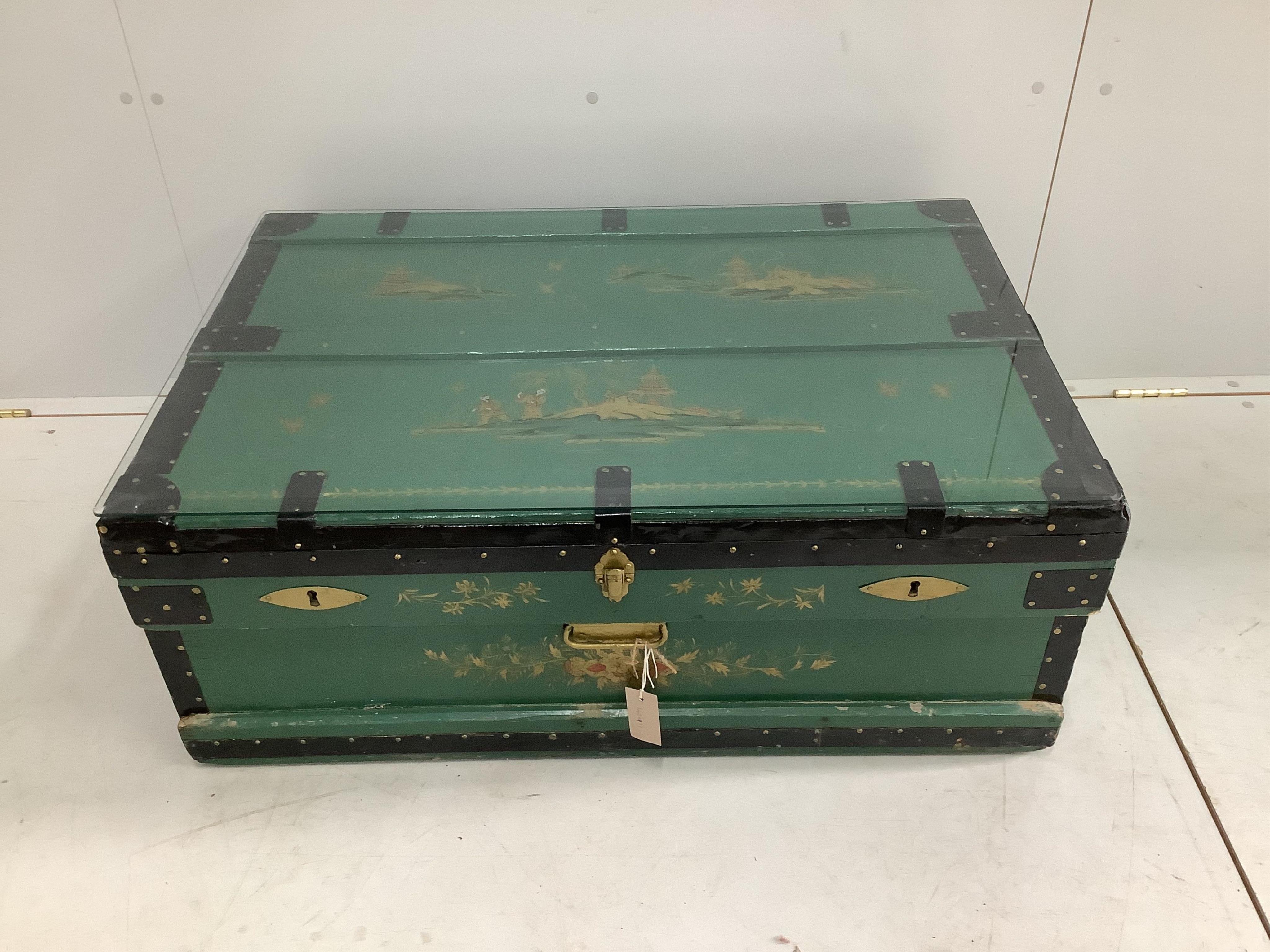 A chinoiserie lacquered trunk, width 90cm, depth 60cm, height 36cm